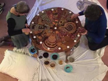 Barbara & Karen work on Solstice mandala